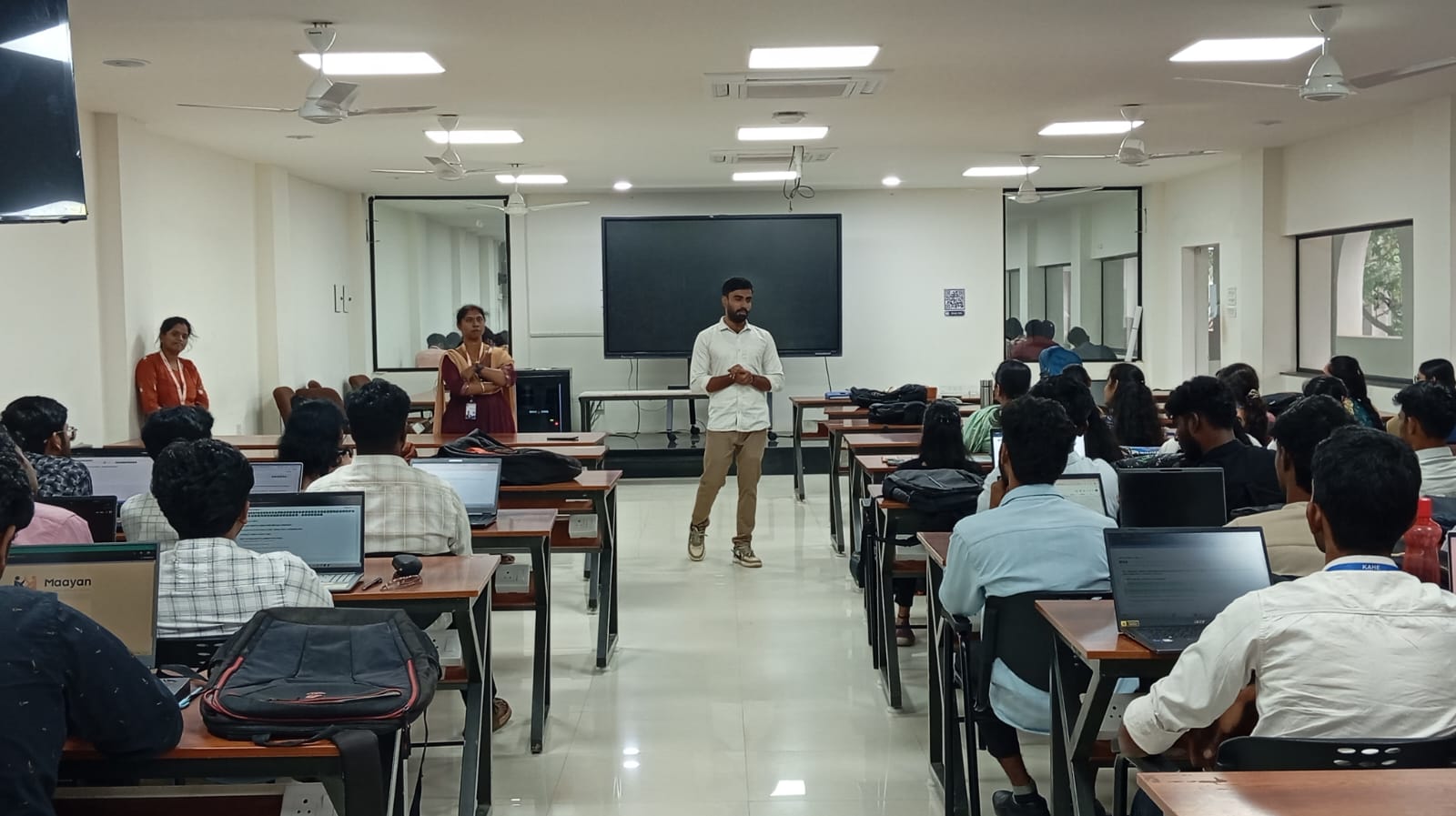 Trainer Ramesh Kumaresan teaching students during PD1 training